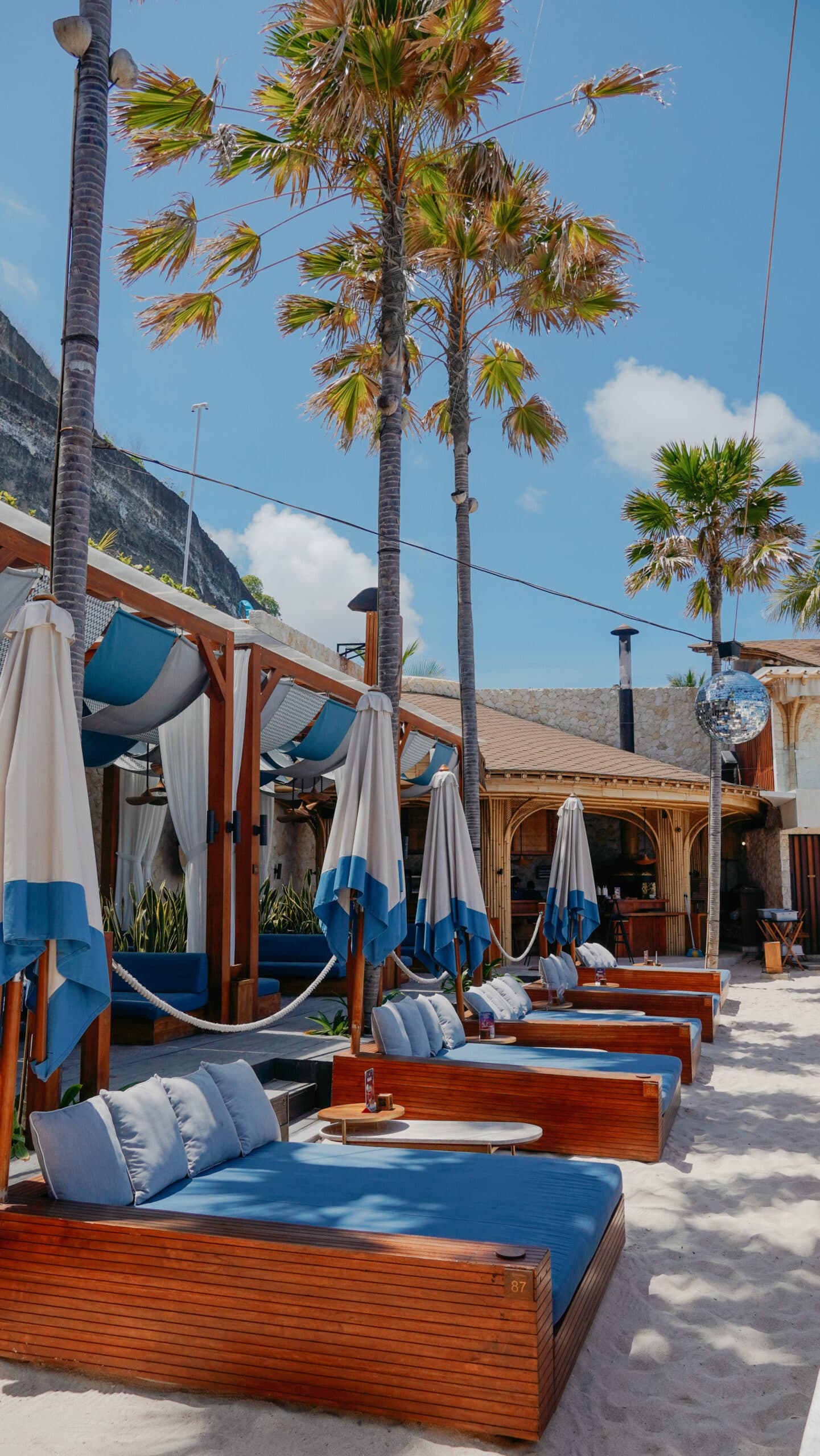 Relax in Style on the Beach with Tropical Temptation Beach Club’s Sand Day Bed