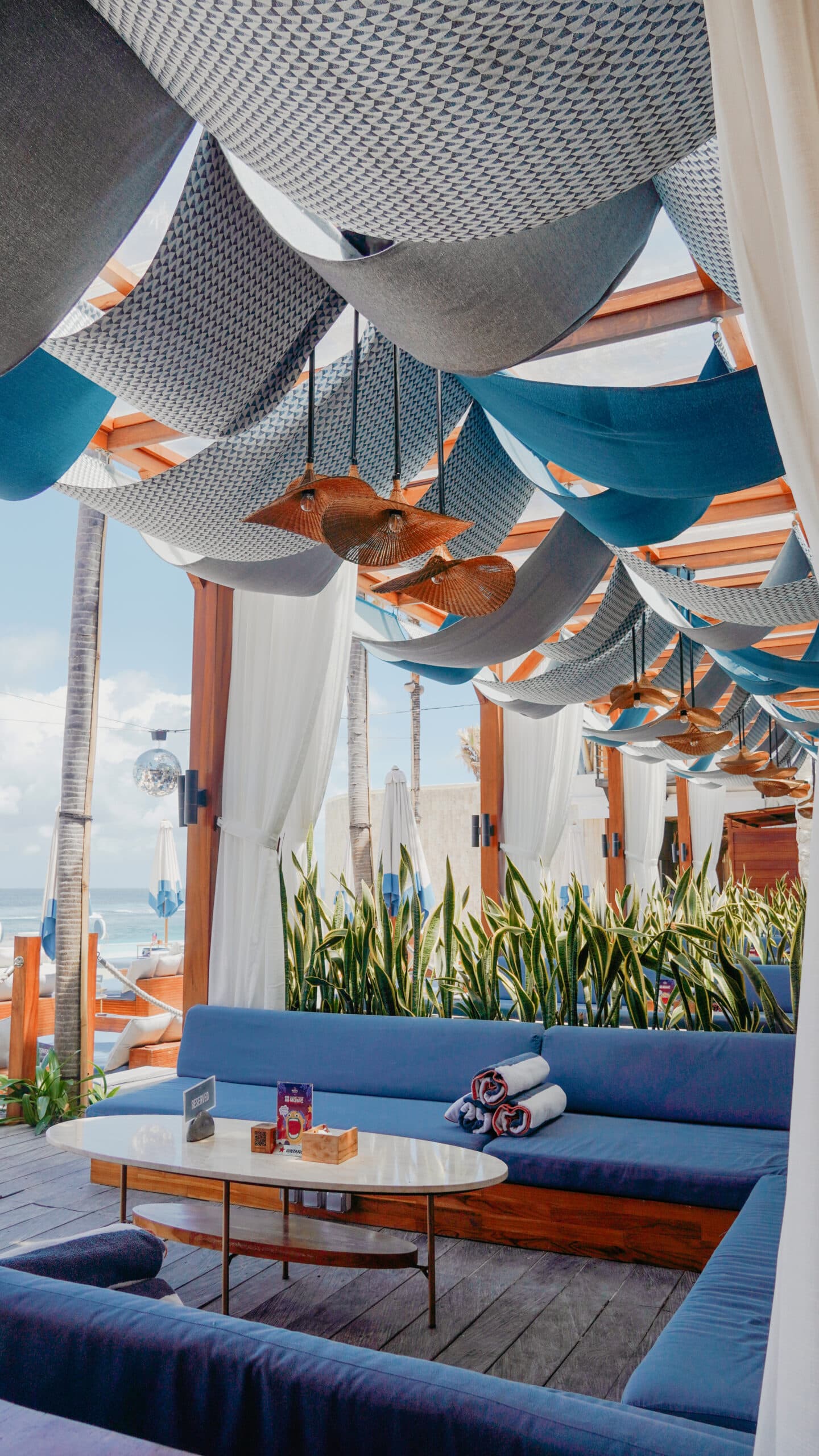 Indulge in The Exclusive Luxury of Tropical Temptation Beach Club by Arriving at The Start of The Day