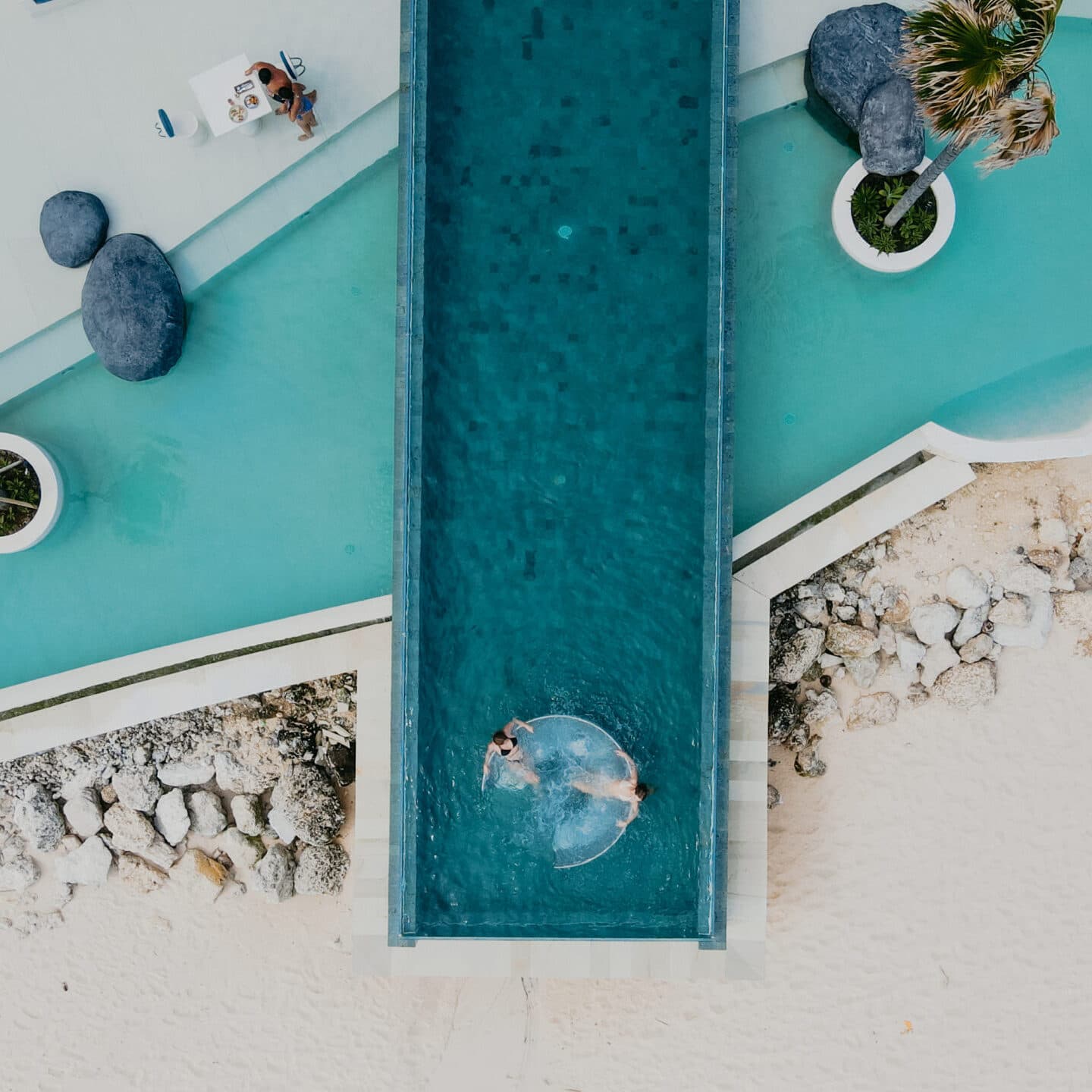 Infinite Beauty: The Three-Layered Glass Infinity Pool at Tropical Temptation Beach Club